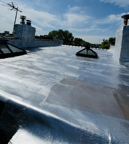 Roof completely replaced with skylight replaced and coating at 25 Rutland Rd, Brooklyn, Ny
